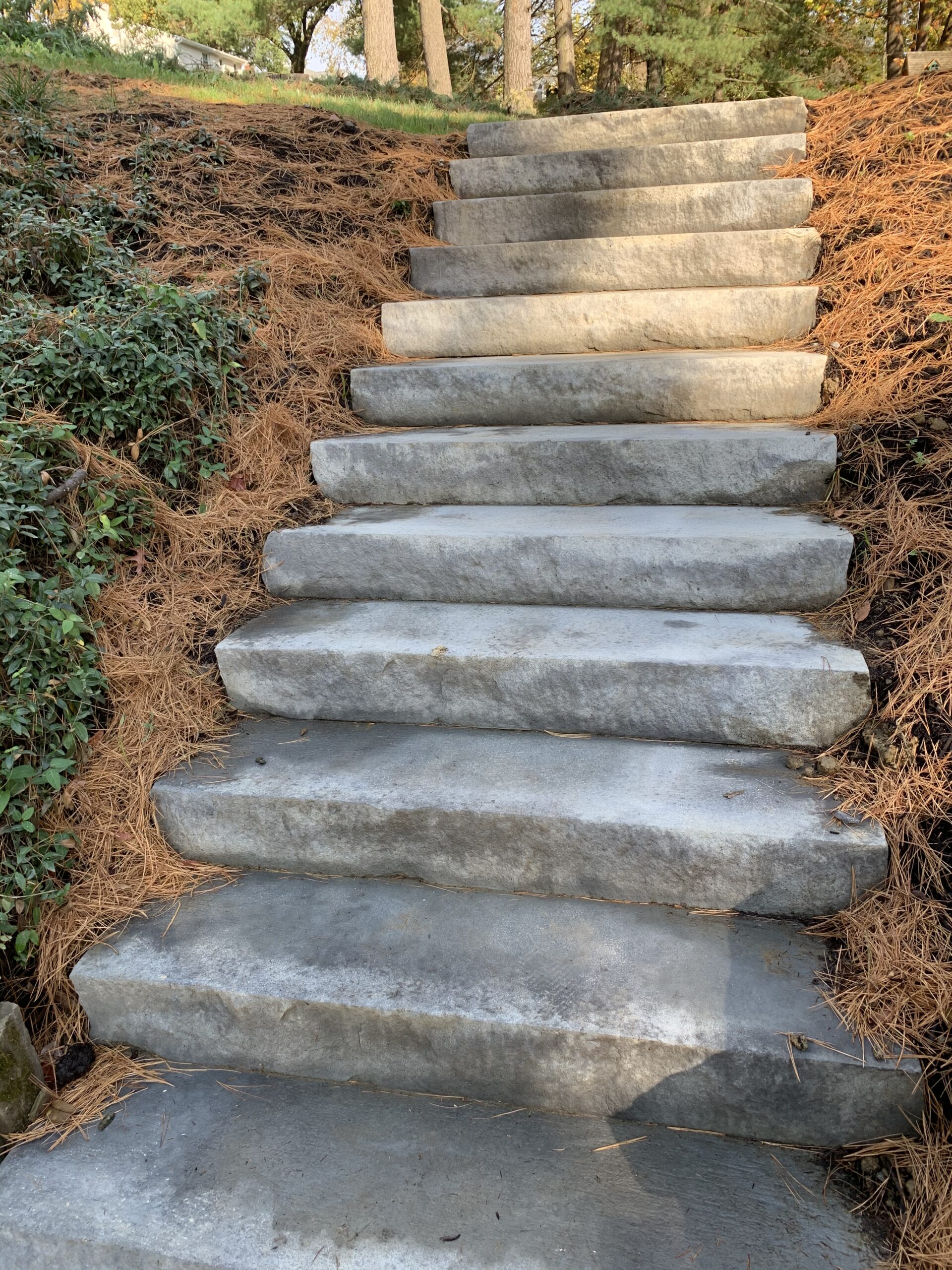 Straw and tack drainage next to stairs